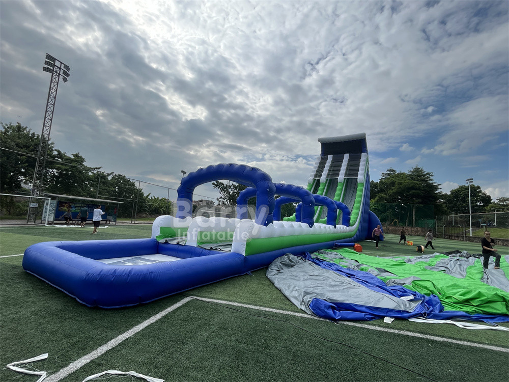 বাণিজ্যিক গ্রেড কাস্টম তৈরি 30x9x13m Wave Giant Inflatable Water Slide For Kids Adults Hot In 5km Inflatable Run
